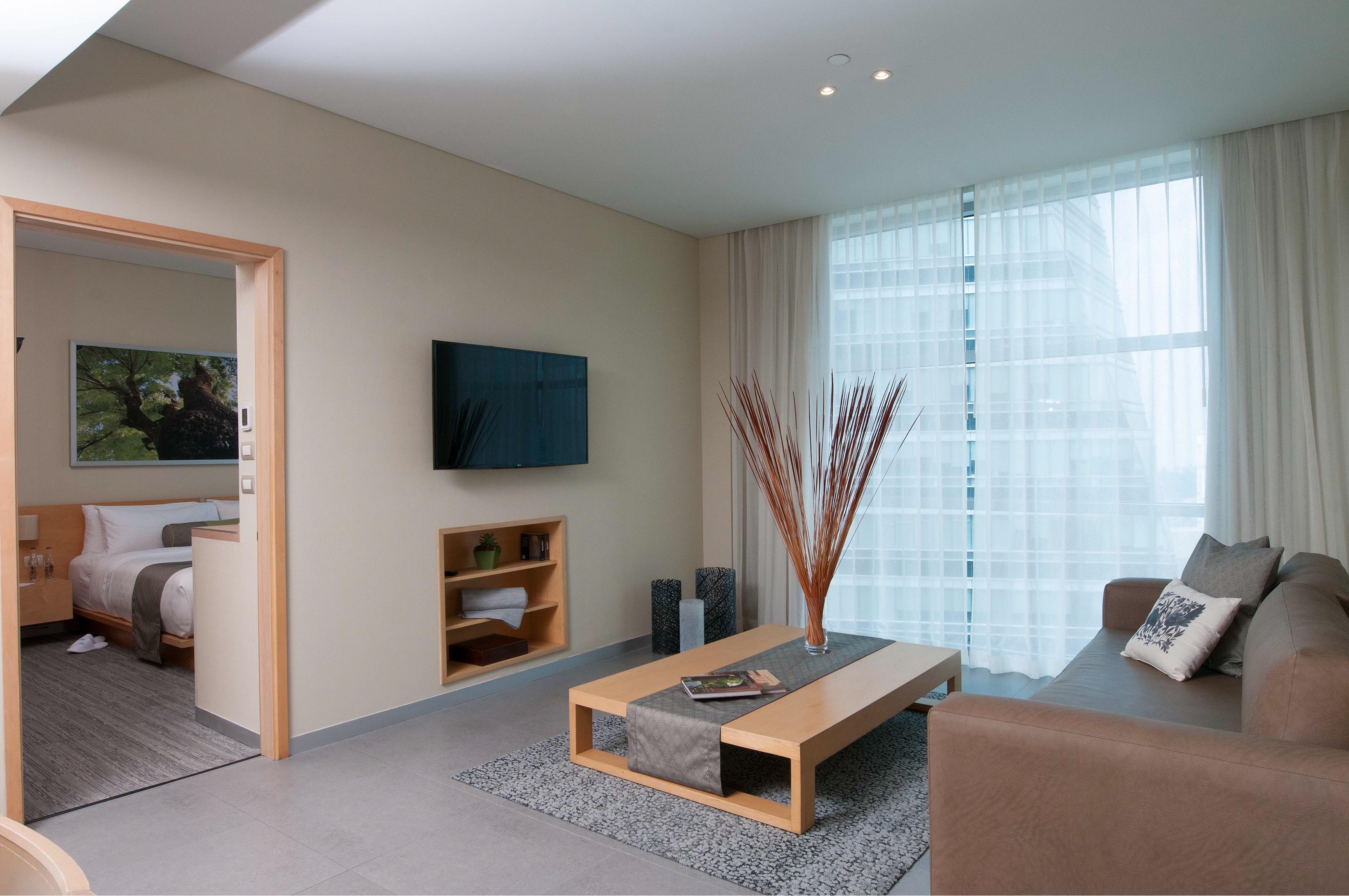 Stadia Suites Mexico City Santa Fe Esterno foto A living room in a hotel suite