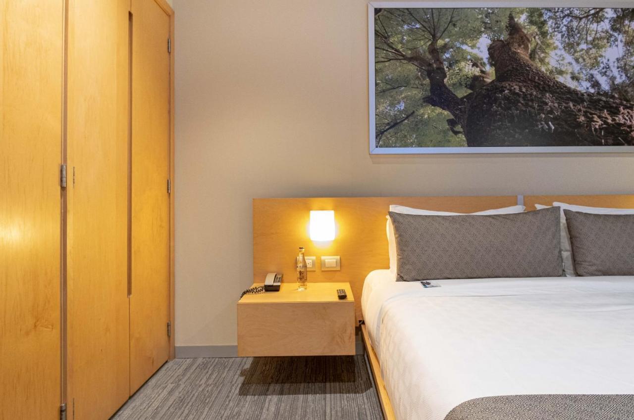 Stadia Suites Mexico City Santa Fe Esterno foto A bedroom at the hotel
